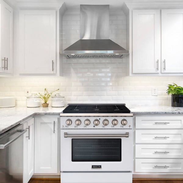 kitchen with gas range and range hood modern