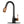 A Two-Tone Matte Black & Rose Gold Pull Out Kitchen Faucet with Deck Plate, isolated on a white background.