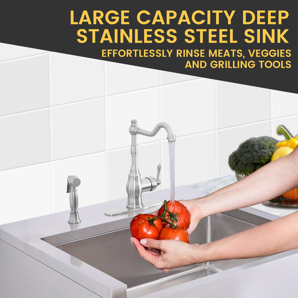 Person washing tomatoes in a large capacity deep stainless steel sink with text highlighting its features.